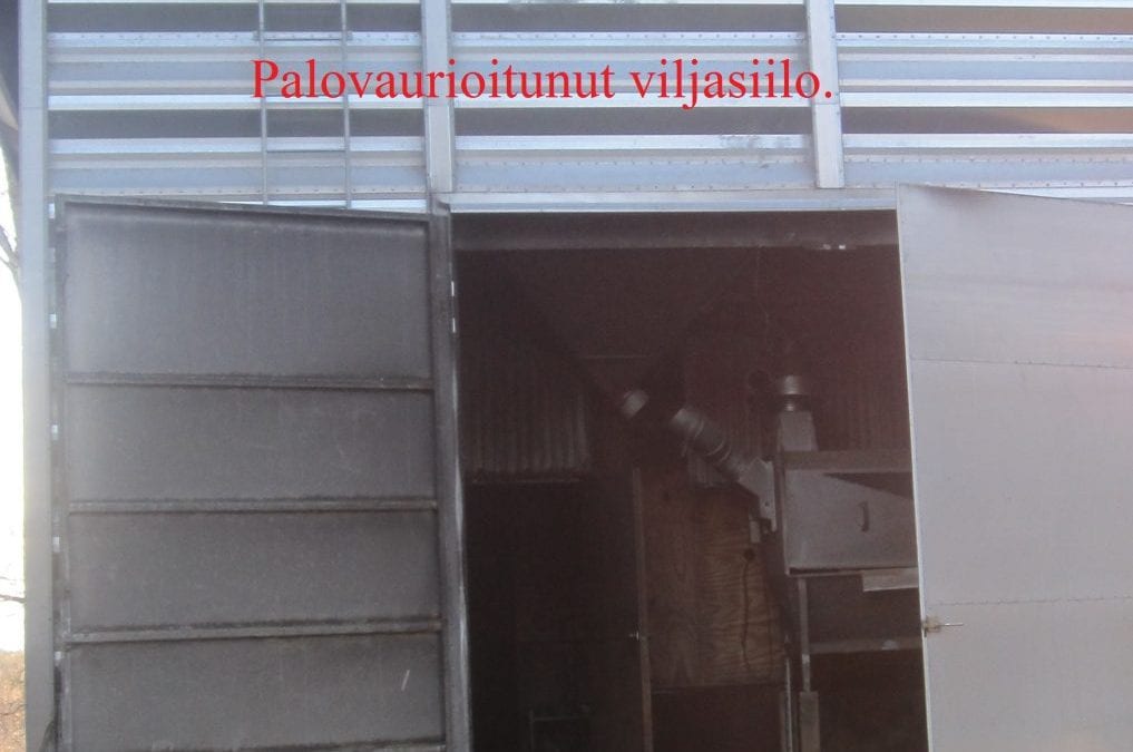 Palo, kaivinkonepalo viljakuivaamossa